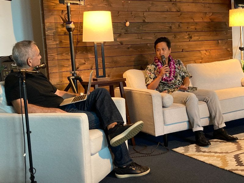 Mitch sits down on the couch with Pastor Dave