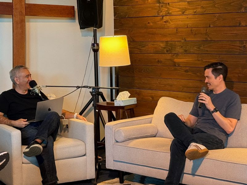 Jason sits down on the couch with Pastor Dave