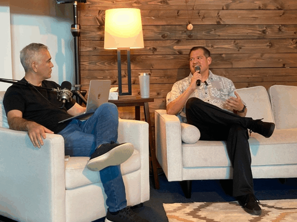 Jose Lopez sits down on the couch with Pastor Dave