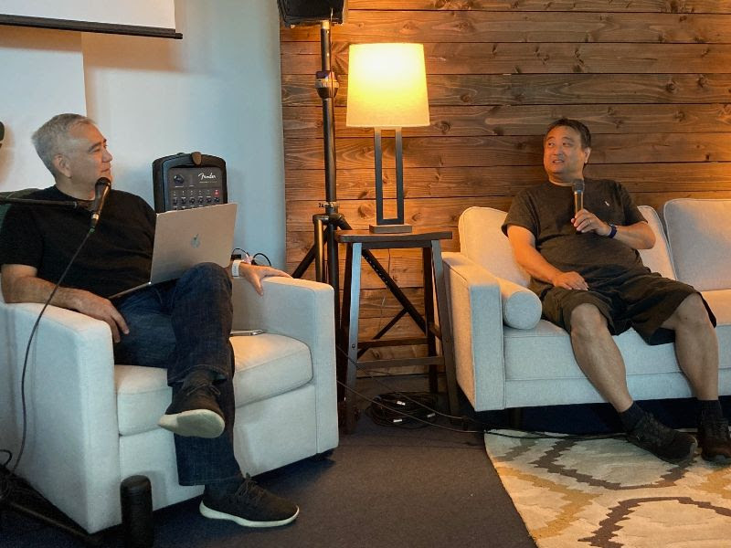 Kevin sits down on the couch with Pastor Dave