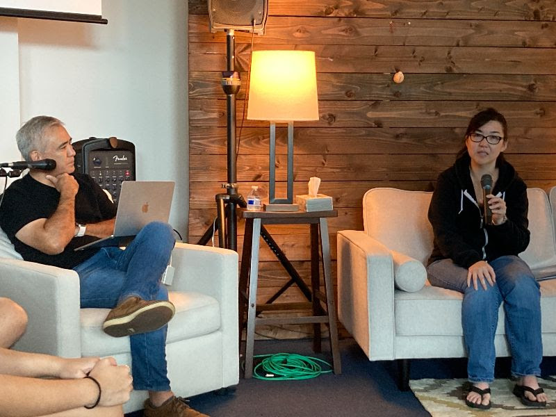 Nan sits down on the couch with Pastor Dave