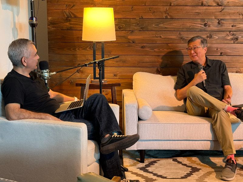 Pastor Mark Morimoto sits down on the couch with Pastor Dave